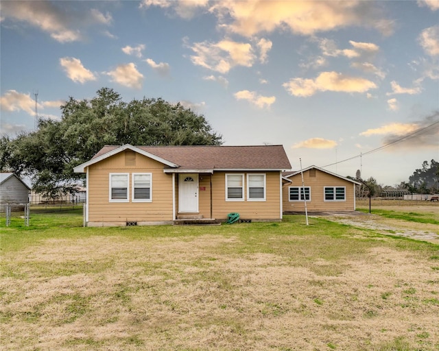 ranch-style house with a front yard