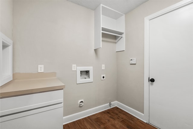 washroom featuring washer hookup, hookup for an electric dryer, dark hardwood / wood-style flooring, and a textured ceiling