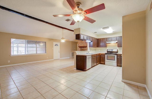 kitchen with light tile patterned floors, sink, ceiling fan, appliances with stainless steel finishes, and a textured ceiling