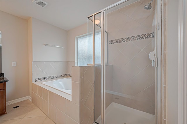 full bathroom with visible vents, tile patterned floors, a garden tub, vanity, and a shower stall