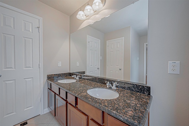 bathroom featuring vanity and tile patterned floors