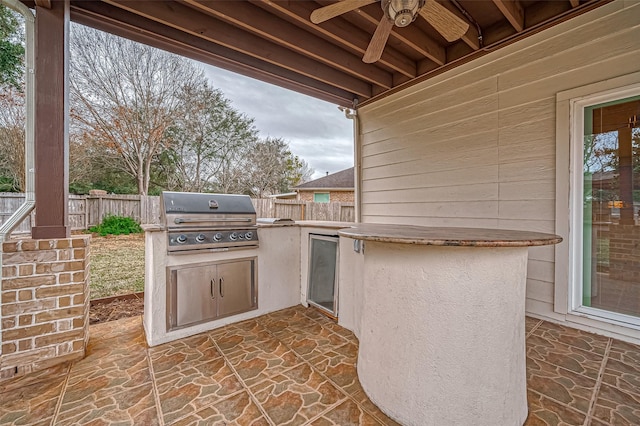 view of patio / terrace featuring grilling area and exterior kitchen