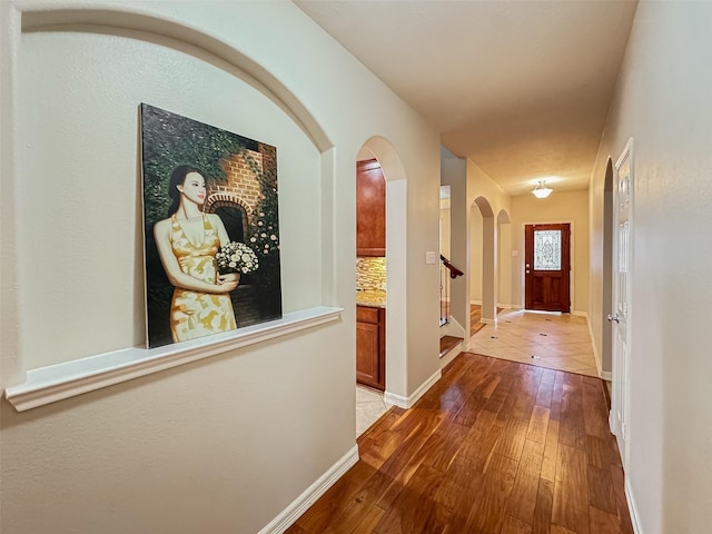 hallway featuring wood-type flooring