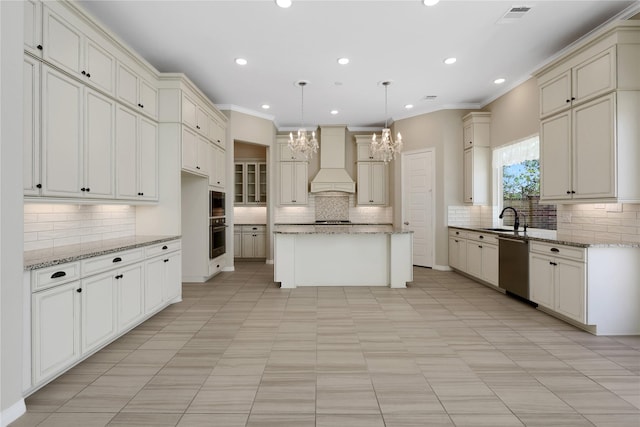 kitchen featuring hanging light fixtures, custom range hood, a kitchen island, stainless steel dishwasher, and oven