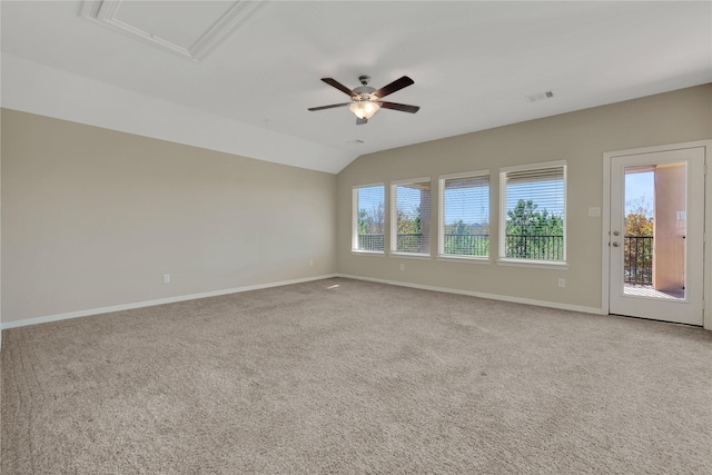 carpeted empty room featuring lofted ceiling and ceiling fan