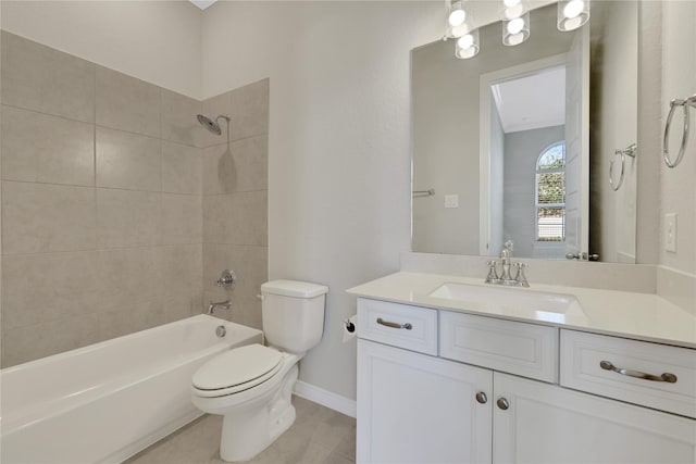 full bathroom featuring tiled shower / bath combo, vanity, and toilet