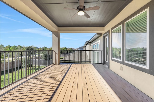 wooden deck with ceiling fan