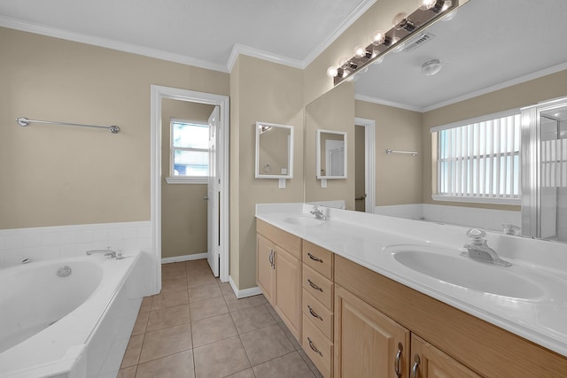 bathroom with crown molding, a tub to relax in, tile patterned floors, and vanity