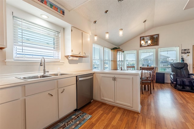 kitchen featuring a sink, white cabinetry, pendant lighting, and dishwasher