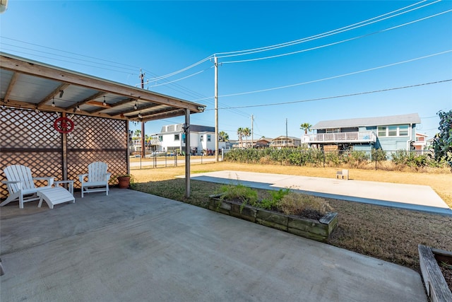 view of patio / terrace featuring fence