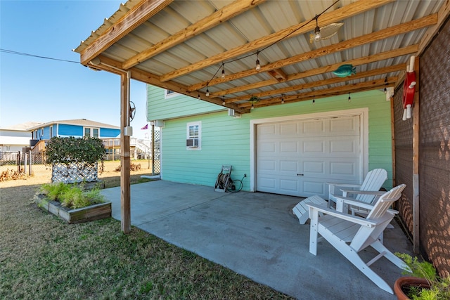 garage featuring fence