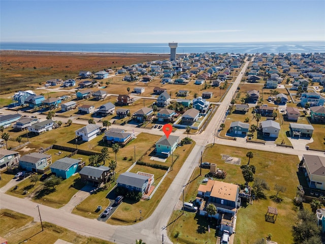 bird's eye view with a water view and a residential view