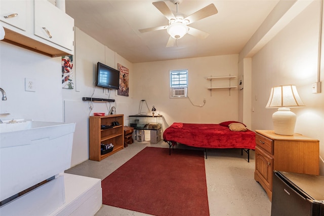 bedroom featuring finished concrete flooring and ceiling fan