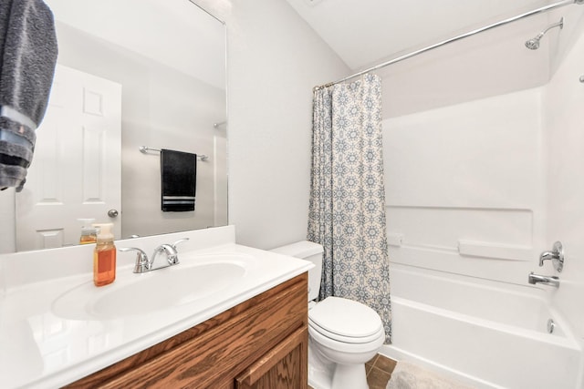 full bathroom featuring tile patterned floors, vanity, toilet, and shower / bath combo