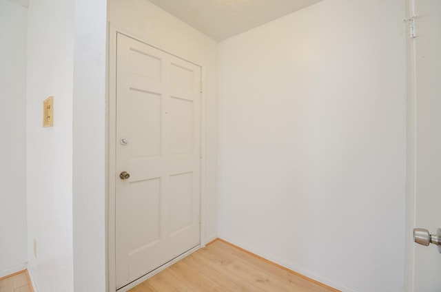 hallway featuring light hardwood / wood-style floors