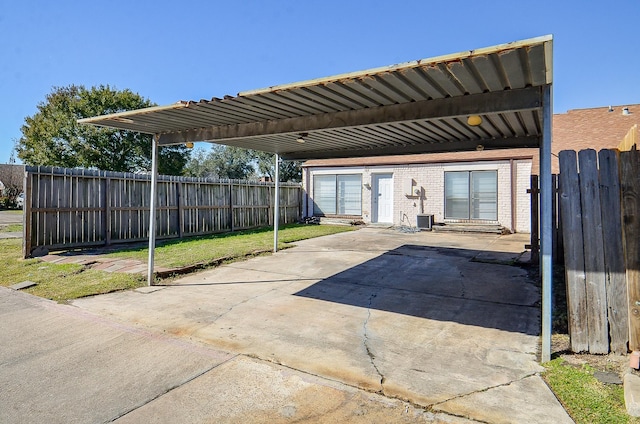 view of patio featuring a carport