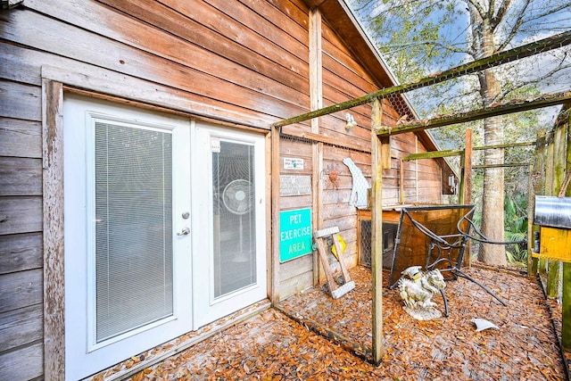 doorway to property featuring french doors