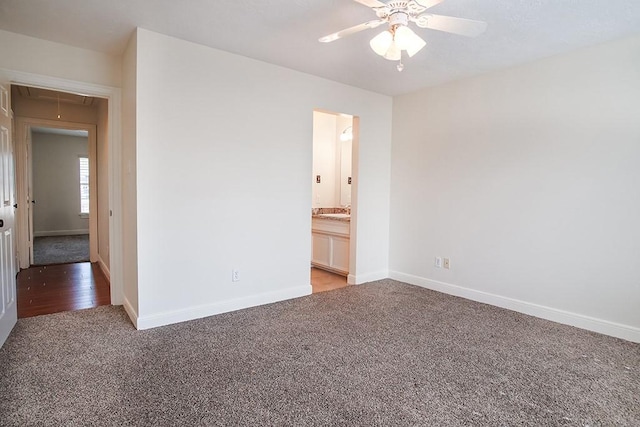 empty room with ceiling fan and light colored carpet