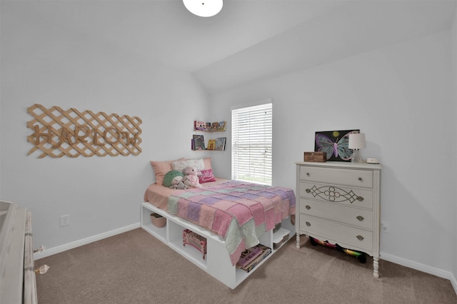 carpeted bedroom featuring lofted ceiling