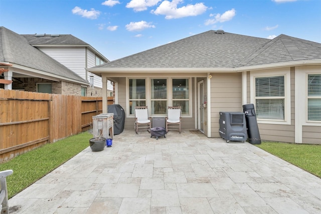 rear view of property with a patio