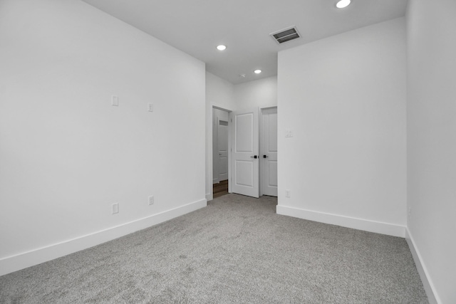 empty room featuring carpet flooring