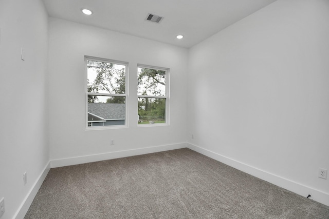 view of carpeted spare room