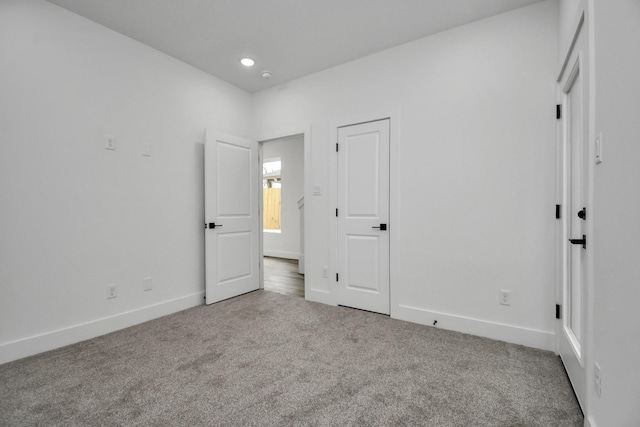 unfurnished bedroom featuring carpet floors