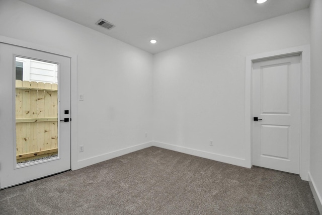 empty room featuring carpet floors