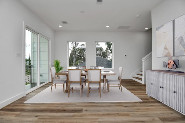 dining area with light wood-type flooring