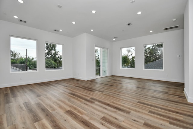 unfurnished room featuring light hardwood / wood-style flooring