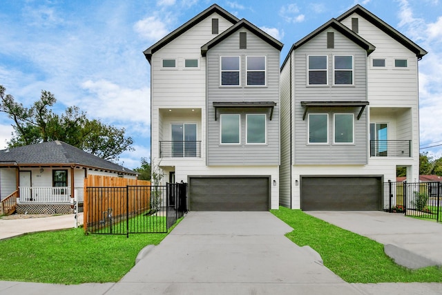 view of front facade featuring a garage and a front yard