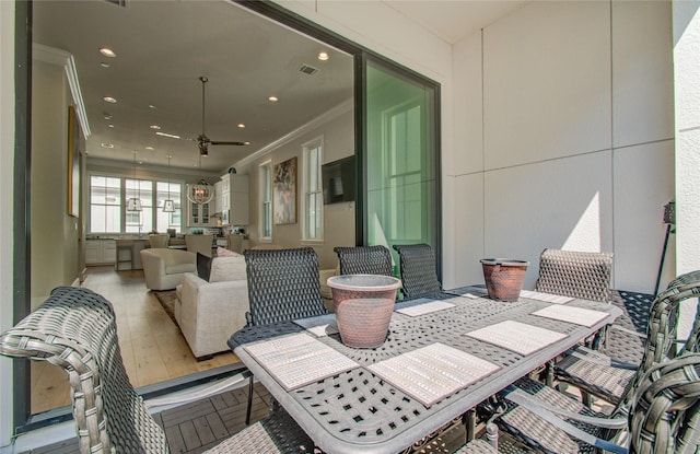 view of patio / terrace featuring ceiling fan