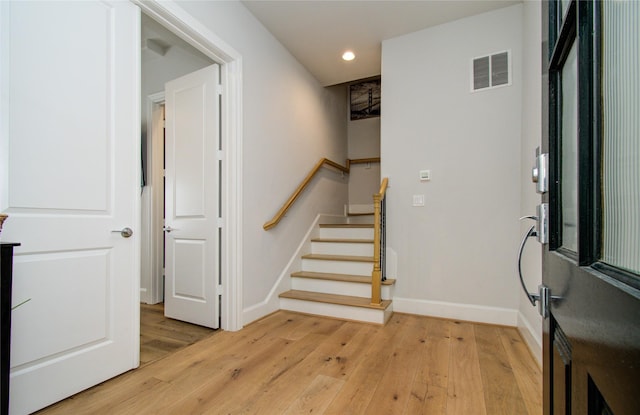 foyer entrance featuring light hardwood / wood-style floors