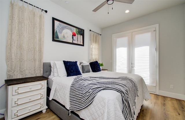 bedroom featuring ceiling fan and light hardwood / wood-style floors