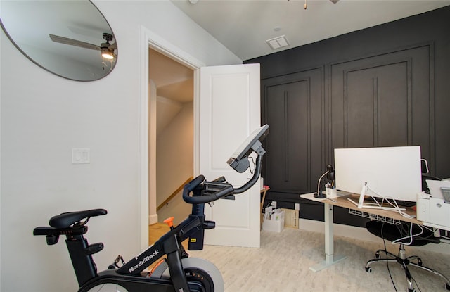 workout room featuring ceiling fan