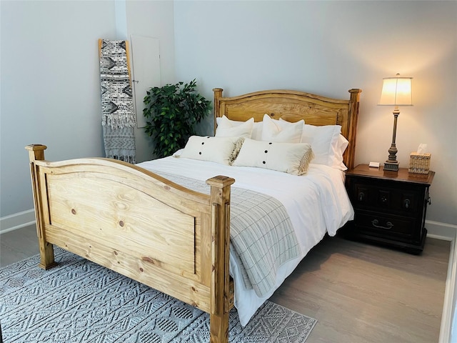 bedroom featuring wood-type flooring