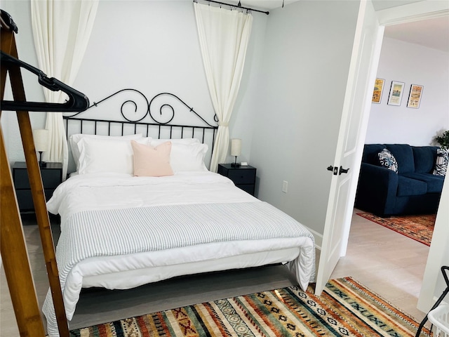 bedroom featuring hardwood / wood-style flooring