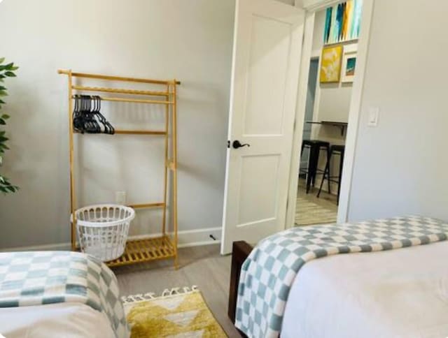 bedroom with light hardwood / wood-style floors