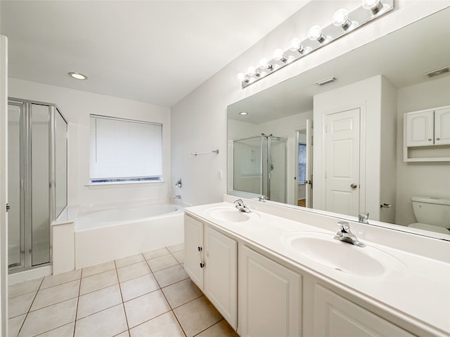 full bathroom featuring tile patterned flooring, plus walk in shower, vanity, and toilet