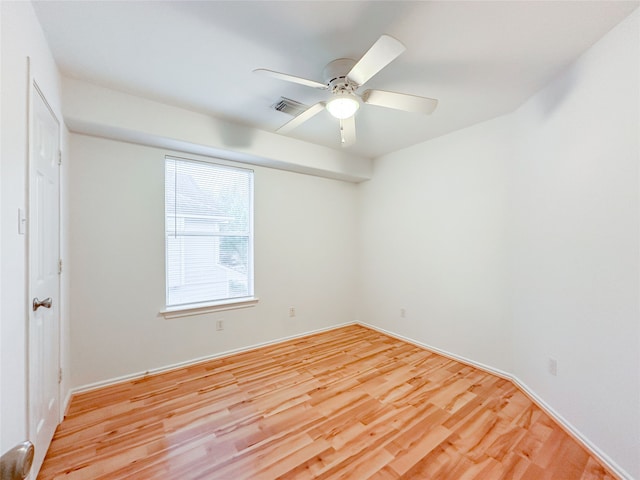 unfurnished room featuring ceiling fan and light wood-type flooring