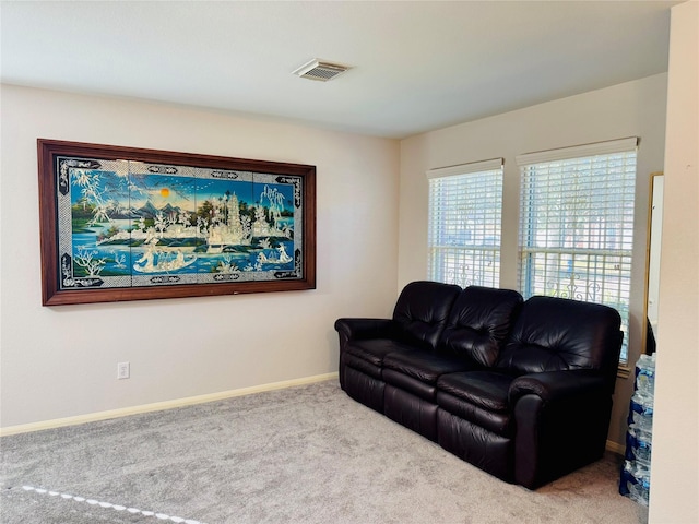 living room with light colored carpet