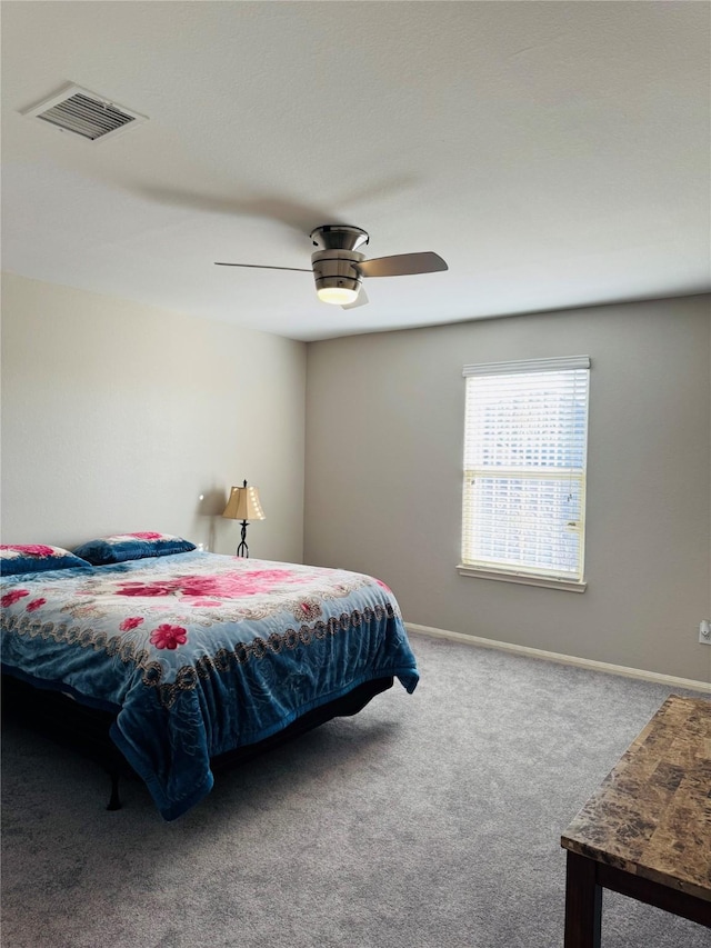 bedroom featuring ceiling fan and carpet flooring