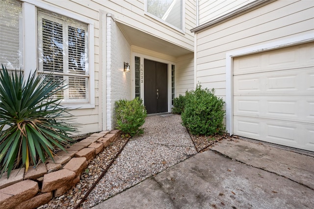 property entrance featuring a garage