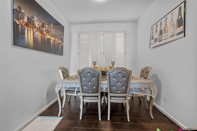 14323 Briarhills Pkwy, Houston, TX 77077 - dining room featuring wood finish floors and baseboards