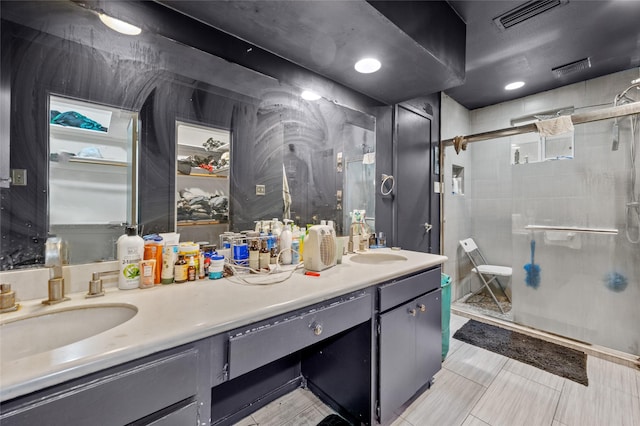 14323 Briarhills Pkwy, Houston, TX 77077 - bathroom featuring double vanity and a shower stall