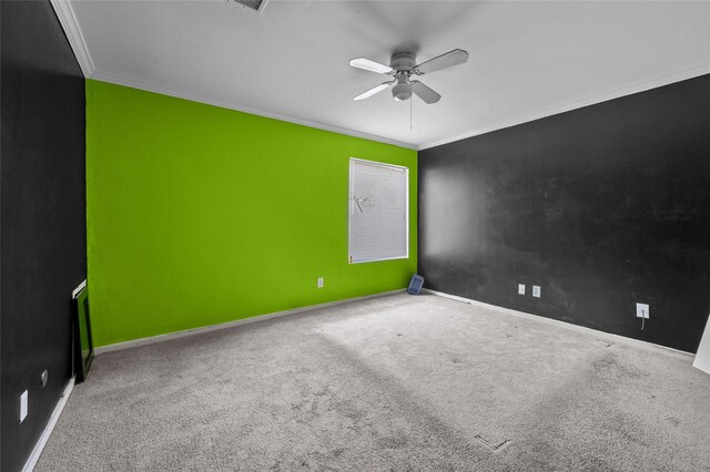 14323 Briarhills Pkwy, Houston, TX 77077 - empty room featuring crown molding, a ceiling fan, and carpet floors