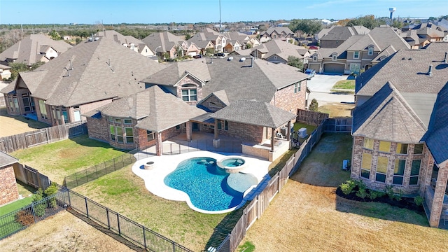 19031 Kimber Creek Ln, Cypress, TX 77429 - view of pool featuring a residential view, a pool with connected hot tub, and a patio area