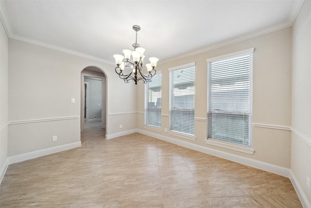 unfurnished room featuring an inviting chandelier and ornamental molding