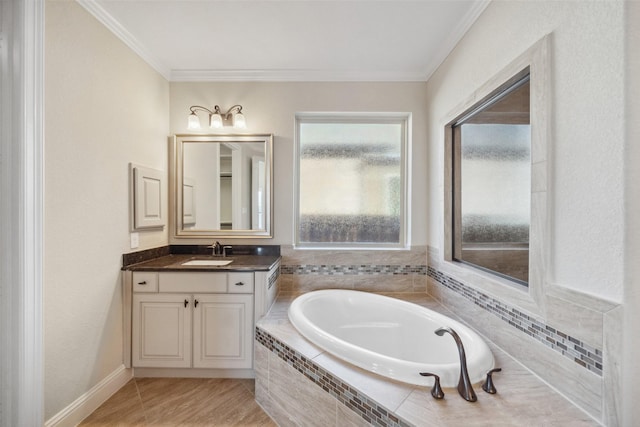 bathroom with a relaxing tiled tub, vanity, and ornamental molding