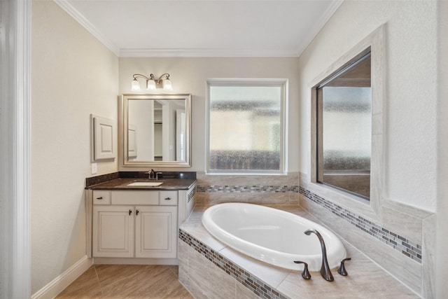 19031 Kimber Creek Ln, Cypress, TX 77429 - bathroom featuring ornamental molding, a garden tub, and vanity